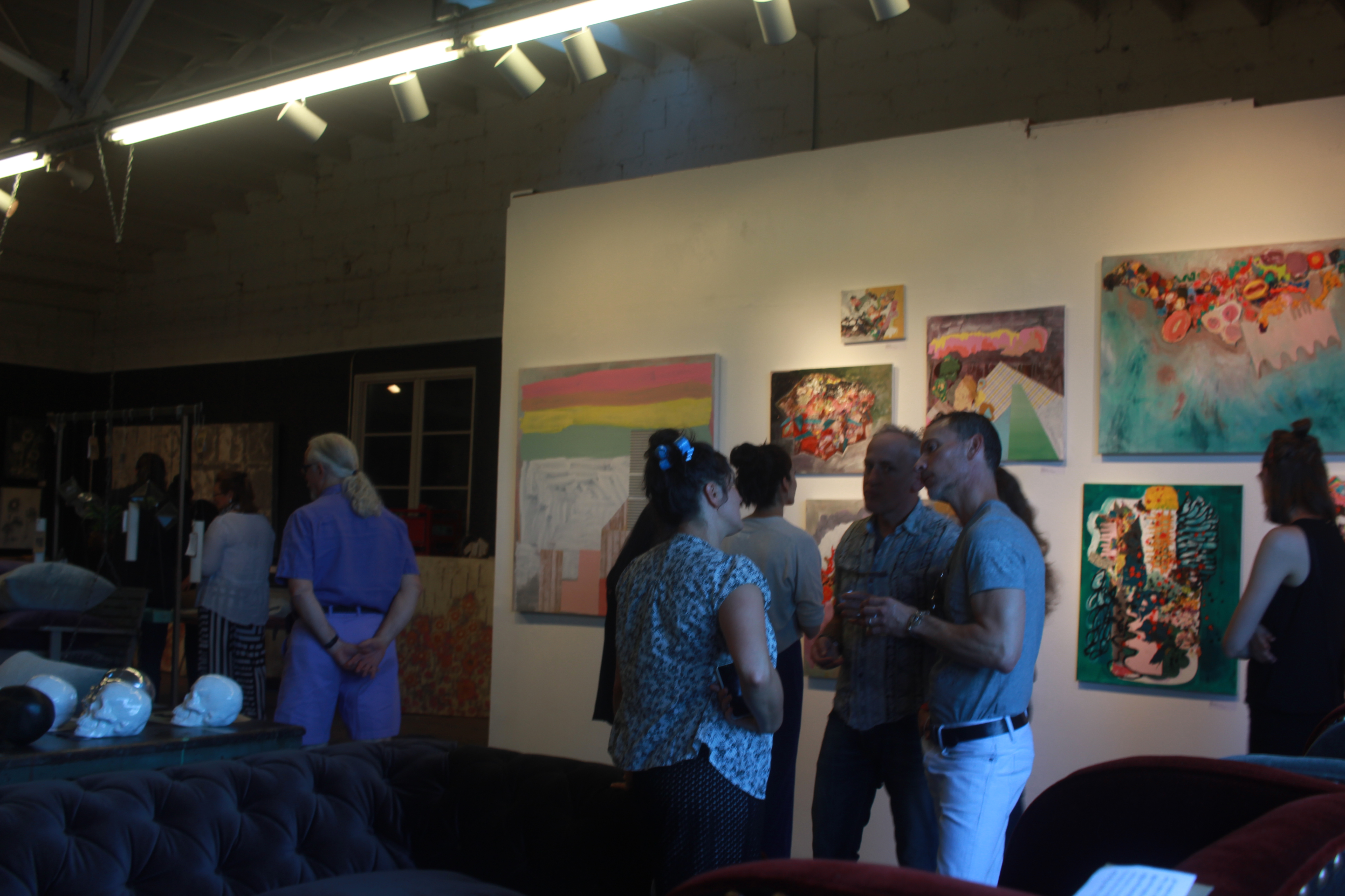 uests chat at the gallery opening of Ursula Gullow's exhibit 'Confetti' on June 10th at London District Studios.